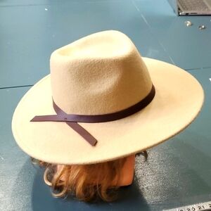 Wool hat, cream color with brown strap. By Universal Thread. Very good condition